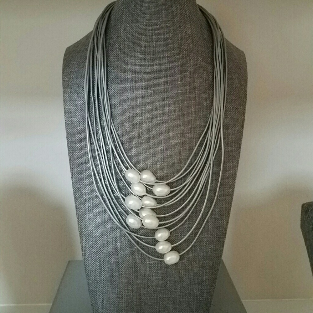 Leather strands with pearls